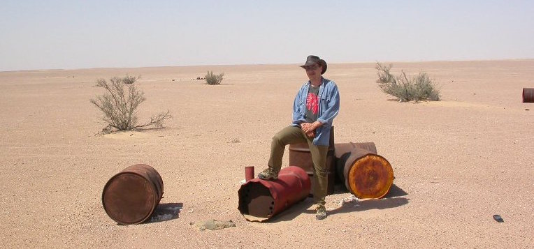 Norbert Classen at the SaU Shergottite Strewnfield in Oman: "I found nothing but these ol' barrels."